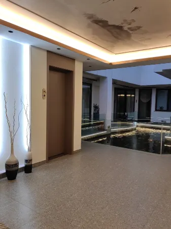 Zigong Jinhui garden hotel Отели рядом с достопримечательностью «Zigong Vocational and Technical College»