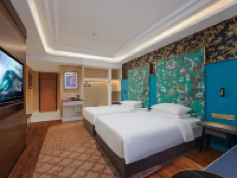 โรงแรมจินเจียง เมโทรโปโล (แม่น้ำยูงคู่เอ่อเล่อ เมืองโลวหลานไม่เคยหลับใหล)