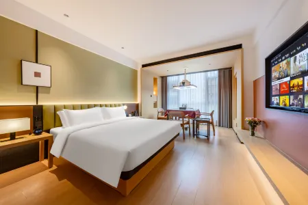 CITY LIGHT Designer Boutique Hotel. Отели рядом с достопримечательностью «Zhuhai City Polytechnic»