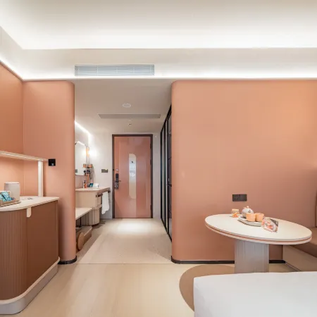 Orange Hotel (Jiaxing Road Food Street Branch, Shihao Plaza, Central District, Leshan City)