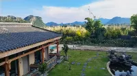 Dang Ge Jia Homestay (Puzhehei) Hôtels à : Swan Lake