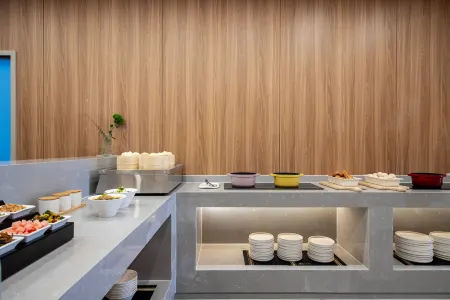 Aifei Hotel (Mianyang Zitong Chongwen Plaza Branch) Отели рядом с достопримечательностью «Liangdancheng»