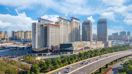 HARBOR REGENT HOTEL Отели рядом с достопримечательностью «Kunming University»