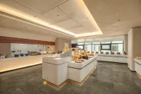 โรงแรมเอทัวร์ วีโกพลาซ่า เวยไห่ - พร้อมอาหารเช้า