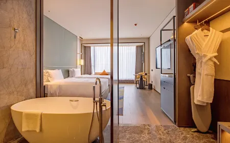 RIZHAO DOWNTOWN Отели рядом с достопримечательностью «Liujiawan Beachcombing Park· Rizhao»