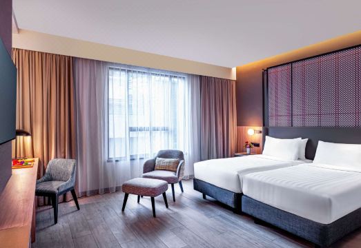 그랜드 머큐어 쿠알라룸푸르 부킷 빈탕의 넓은 침대