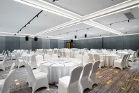 Maison New Century Hotel Lu'an