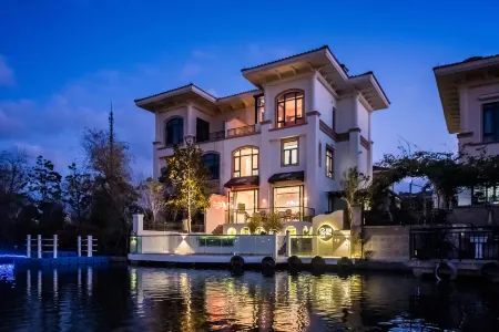 Floral Hotel · 26 Du Fangyuan Hotel (Qidong Seaside Venice) Отели рядом с достопримечательностью «Yuantuojiao Scenic Resort»