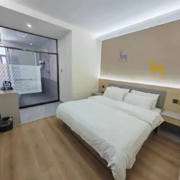 Homeinn Pebble Hotel (Tailai County Zhenxing Road)