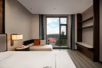 วิลล่าและรีสอร์ทนานาชาติลูซานเมาเทน - โรงแรมราคาถูก