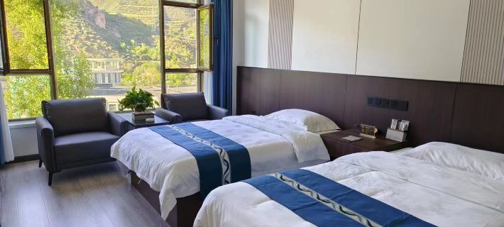 Xinhai Holiday Hotel Hotele w: Powiat Lintan