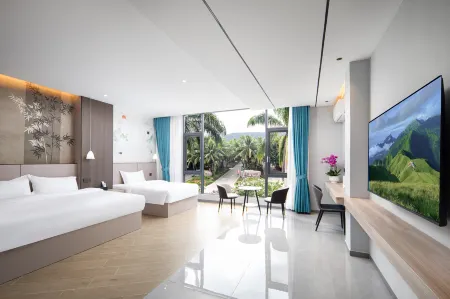 Baoting Sandao Yujing Rainforest Business Hotel Отели рядом с достопримечательностью «Bing Lang Gu»