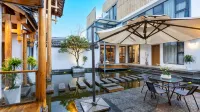 Dali Ancient City. Shanyuyishe Boutique B&B - maisons de vacances