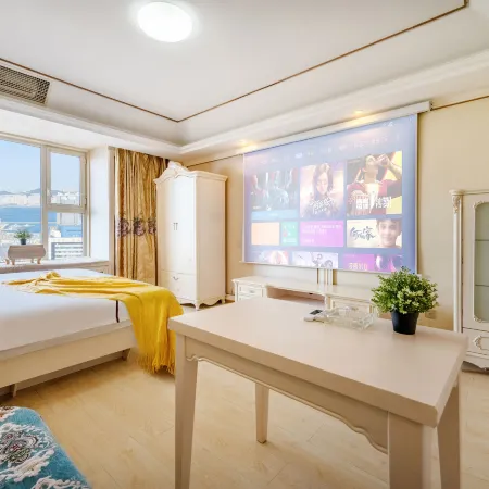 Ganghui Four Seasons Hotel Apartment (Dalian Railway Station Zhongshan Square)