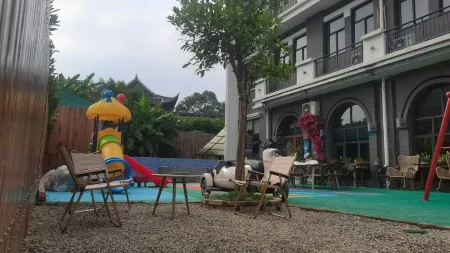 Man Fang Ju Guesthouse Отели рядом с достопримечательностью «Sanyintan (The Three Hidden Pools)»