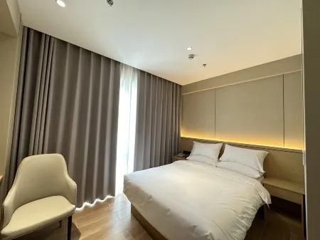 Jinsanyuan Garden Hotel (Hongzhou Night Market, Malu Packaging City, Jiading, Shanghai) Отели рядом с достопримечательностью «Guyinxingshu Park»