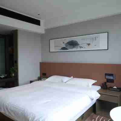 章源國際酒店 Rooms