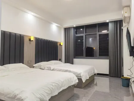 Hanshou Xinyu Business Hotel Отели рядом с достопримечательностью «Hunan Changde Wildlife World»