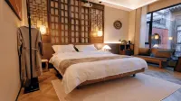 Taohua Island Jianghu Hot Spring Homestay Hotel (Xinzhou Ancient City Branch)