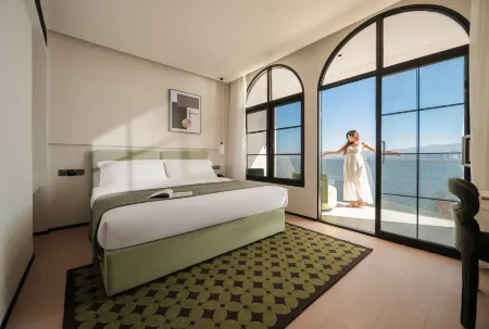 Sea View Hotel Lingxin Banhai Отели рядом с достопримечательностью «Plateau Pearl Tower»