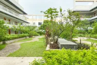 Jingfang E-sports Hotel (Shenzhen Shiyan Hongfa World Store) 스옌 호텔