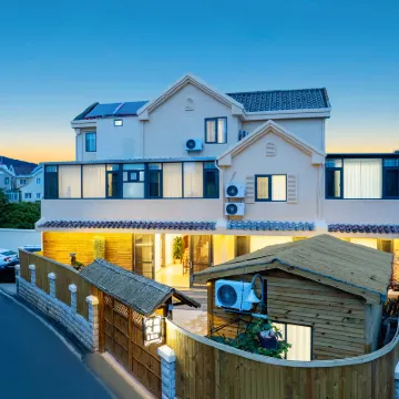 昆明燈火闌珊WatchingSeagulls智能美宿（滇池海埂大壩店） 鄰近海埂大壩的酒店