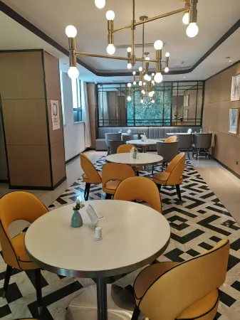 Jiangzhixing Hotel (Suqian Bus Terminal) Отели рядом с достопримечательностью «Nanhailu Theme Square»