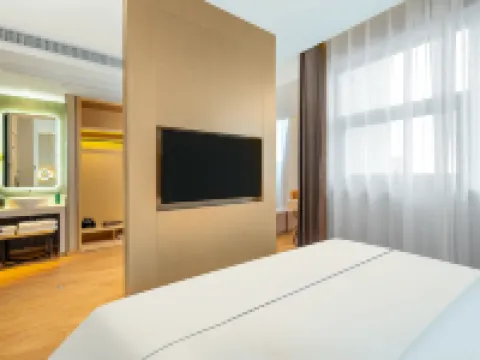 Xingshan WAVE Hotel (Jingjiang People's Park) فنادق في جينغجيانغ