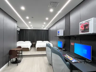 HG E-sports Hotel Отели в г. Downtown