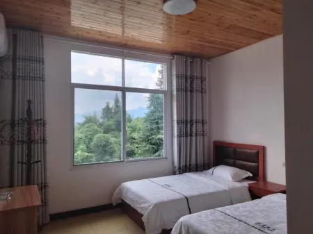 Enshi Xinyue Farm Отели рядом с достопримечательностью «Enshi Suobuya Stone Forest Scenic Area»