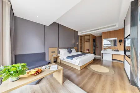 Ziyueqi Light Luxury Hotel (Meishan East Station Wanda Plaza)