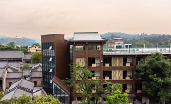 Dingnan County Blossoming in Order Bula Hotel