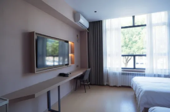 西部春賓館 鄰近庫魯克塔格山的酒店