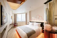 โรงแรมหลงจู (ชิงฮุ่ยหยวน โอเวอร์ซีส์ และ OCT ฮาร์เบอร์ พลัส)