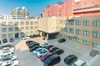 許昌棠悅美居飯店（胖東來時代廣場店） 許昌學院(東校區)-軟件職業技術學院附近的飯店