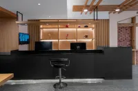 Xi Er Man Hotel (Huaguoyuan Twin Towers Fangyuanhui Dolphin Plaza)