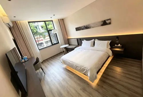Fuyuan Qile Hotel - parking