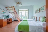 Beihai Her Small Courtyard Homestay (Qiaogang Fengqing Street International Passenger Port Branch)