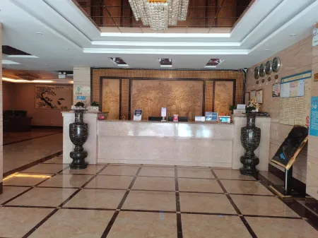 Xingren Tianli Hotel Отели в г. Синжэнь