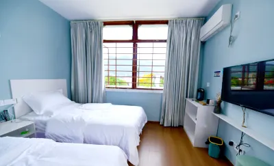 Hanyuan Lihuayuan Homestay Отели рядом с достопримечательностью «Tangjiaxiang Passenger Transport Terminal»