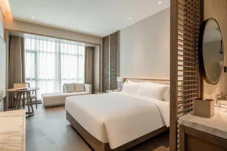 AMBER HOTEL Отели рядом с достопримечательностью «Xinxiang University»