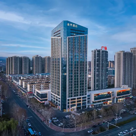 Meiji Hotel (Jiaozuo High-Speed Railway Station Wanda Plaza) Отели в г. Цзяочжуо