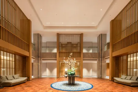 Huhua International Hotel (Shanghai Wujing Hua Normal University Branch) Отели рядом с достопримечательностью «Zhuanqiao Park»