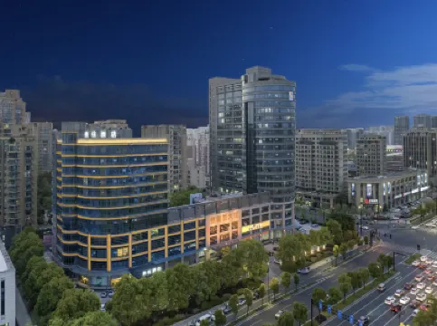 Taizhou Meizhu Hotel (Jiaojiang City Government Avenue Baolongcheng Store) Hotels near Taizhou Sports Center Stadium