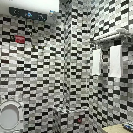 Jiuzhi Shijia Business Hotel