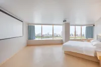 Baiyue Business Hotel (Xin Municipal Hospital)