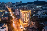 Huasai Hotel Hoteles cerca de Parque Labor