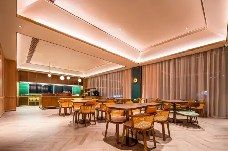 Orange Hotel (Suqian Development Avenue Chujie Branch) Отели рядом с достопримечательностью «Suqian University»