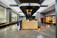 Elong Hotel (Quzhou High-Speed Railway Station Guojin Center)