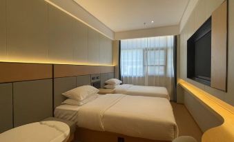 Xinyi International Hotel (Xihongmen Huiju Shopping Center Subway Station)